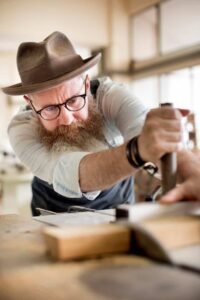 carpenter craftsman handicraft wooden workshop concept 768x1151 1